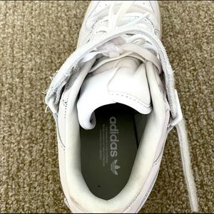 White platform adidas sneakers. Never worn, size 4